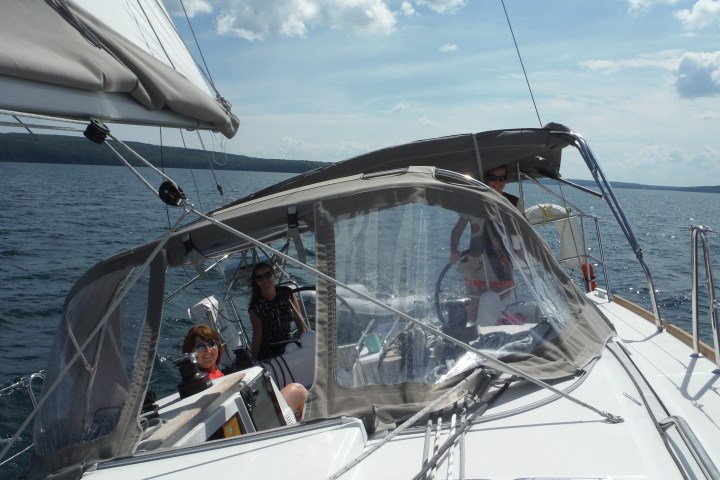 Large sailboat heeling into the wind