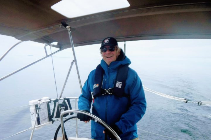 a man riding on the back of a boat