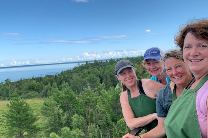 girls at the top of a lighthouse