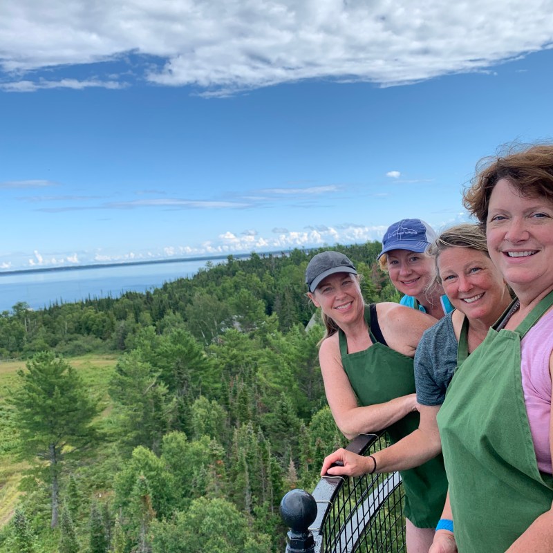 girls at the top of a lighthouse