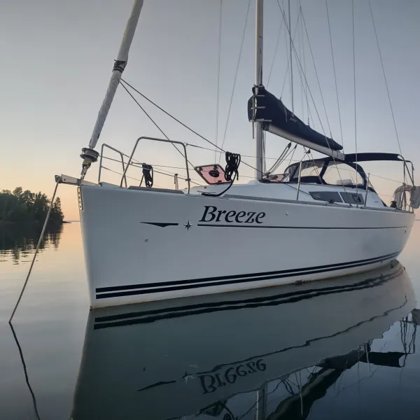 a small boat in a body of water