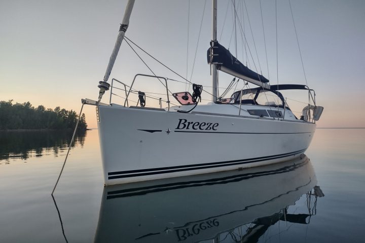 a small boat in a body of water