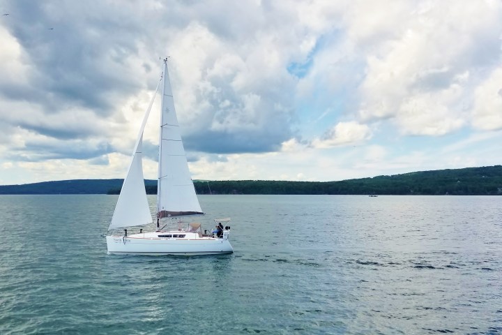 Small sailboat cruising through Lake Superior