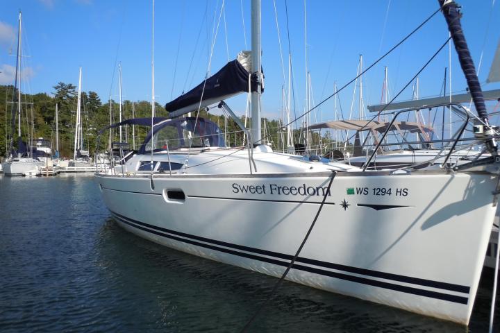 Front view of Sweet Freedom sailboat while docked