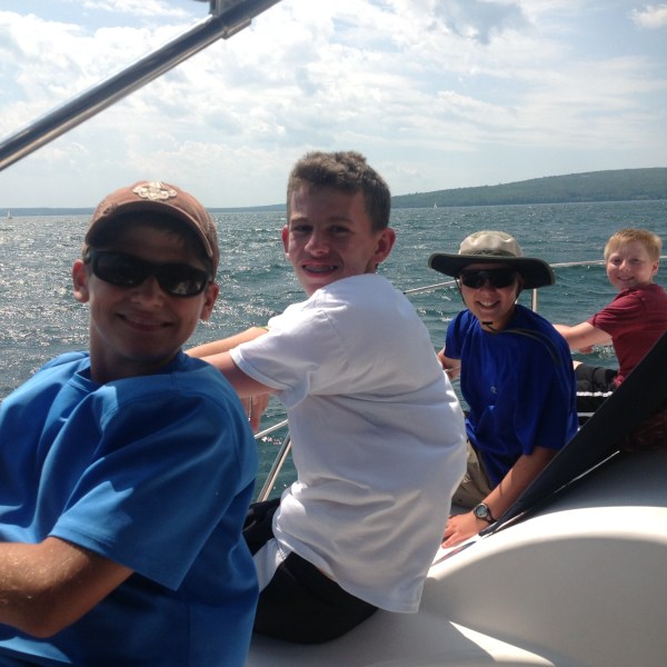 Troop of Boy Scouts sailing