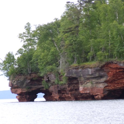 Photo of cliffs dropping into Justice Bay
