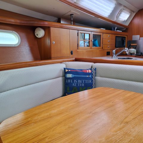 a large jetliner sitting on top of a wooden table