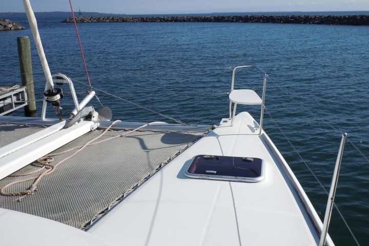 a boat is docked next to a body of water