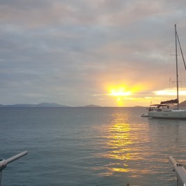 a small boat in a large body of water
