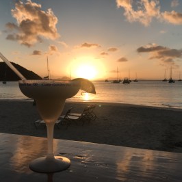 a sunset over a body of water