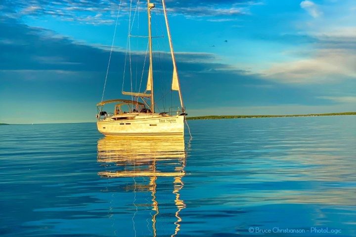 a small boat in a body of water