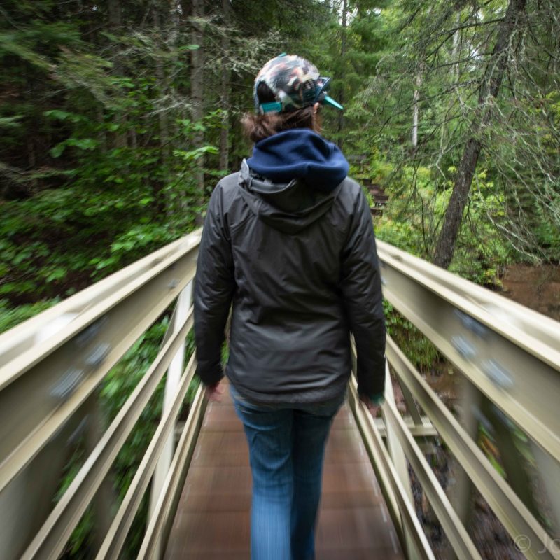 a man riding on the train tracks