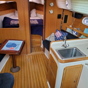 a desk with a computer on a table