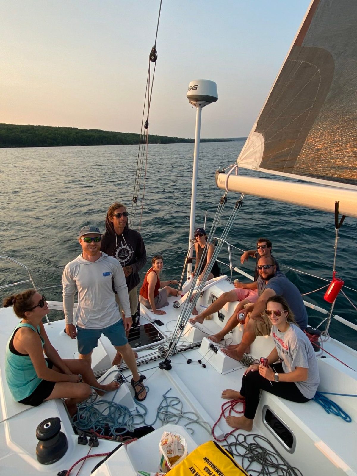 a group of people riding on the back of a boat