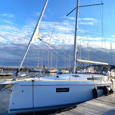 a boat is docked next to a body of water