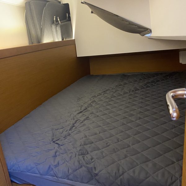 a made bed in a room