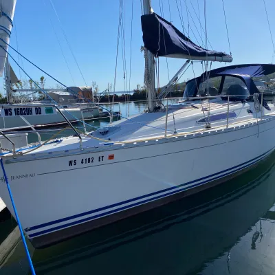 a boat is docked next to a body of water