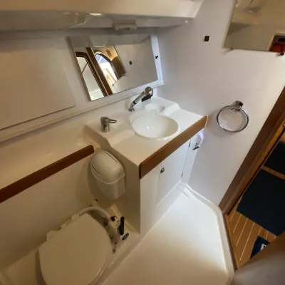 a close up of a sink and a mirror