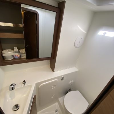 a restroom with a sink and a mirror