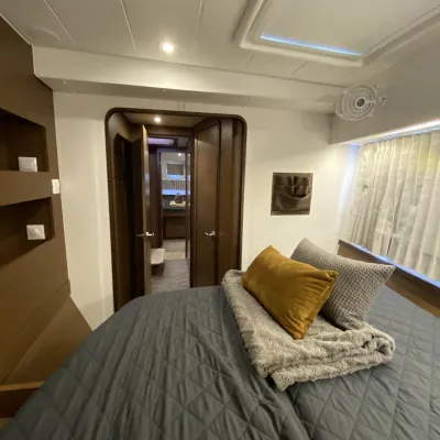 a bedroom with a large bed sitting in a room