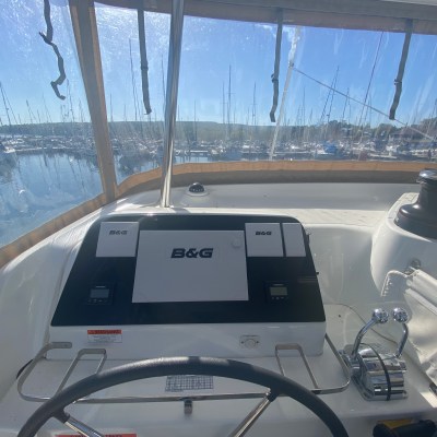 a boat sitting on top of a car