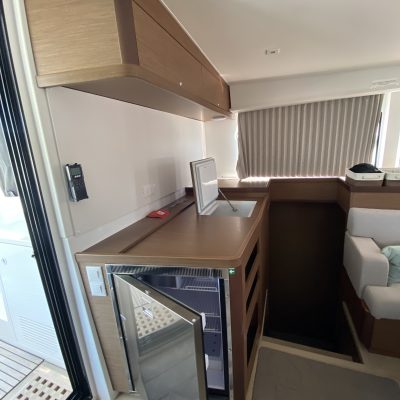 a bedroom with a bed and desk in a room