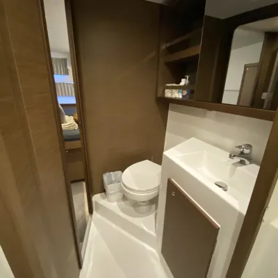 a restroom with a sink and a mirror