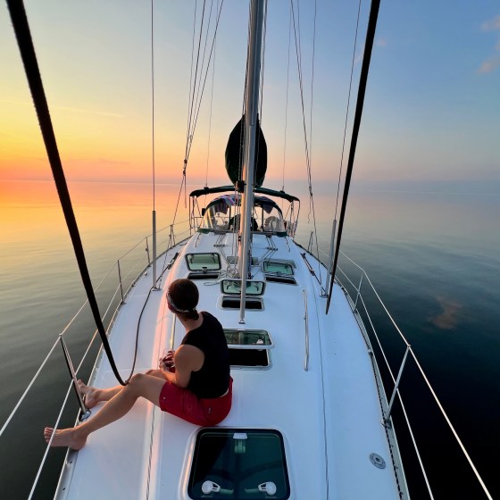 a man in a boat on a body of water