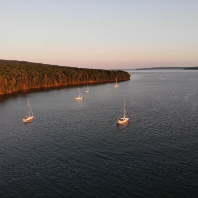 a small boat in a large body of water