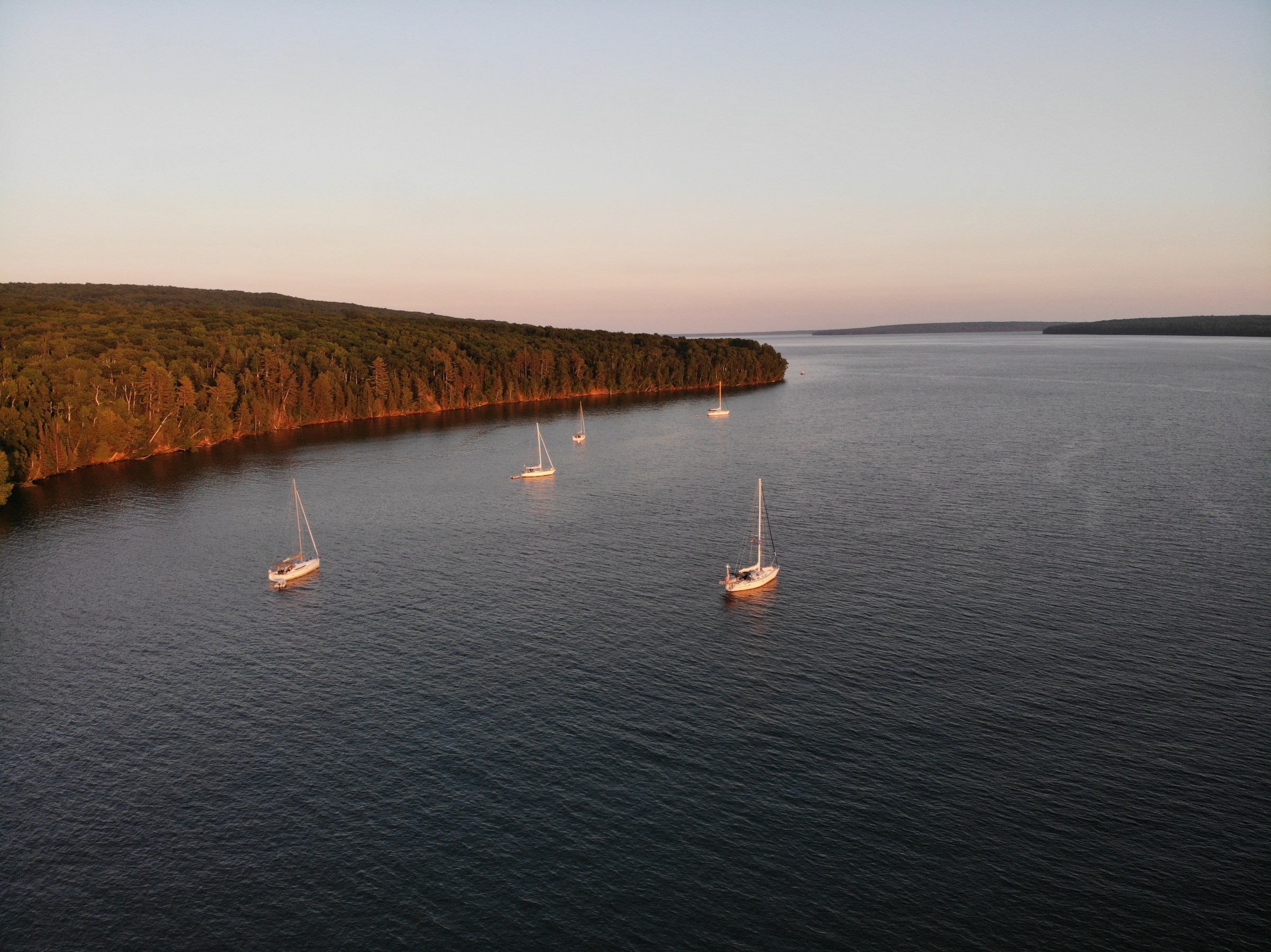 a small boat in a large body of water