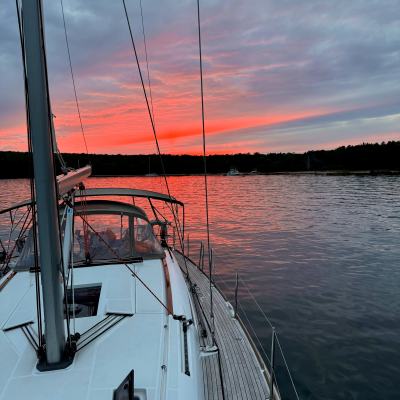 a boat is docked next to a body of water