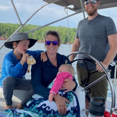 a group of people sitting on a boat