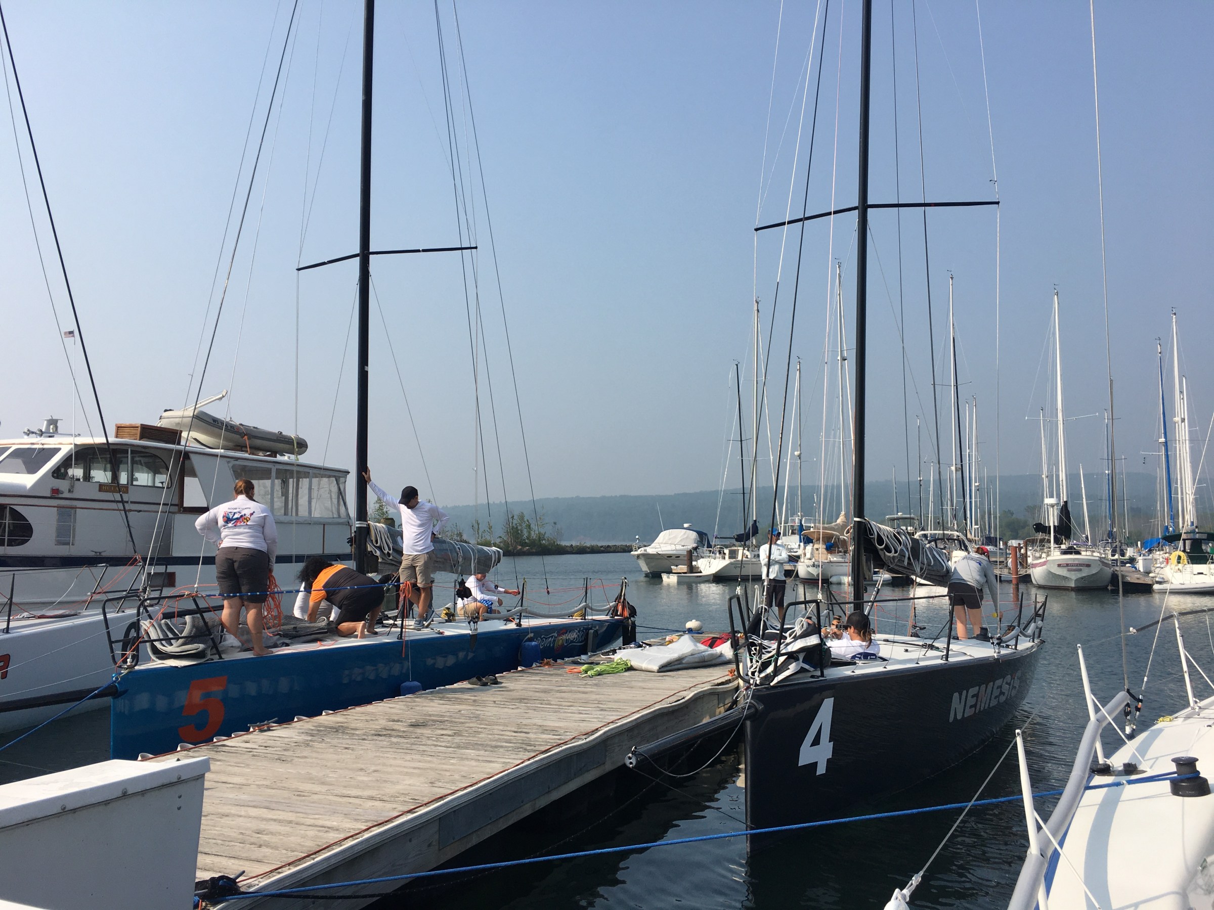a boat is docked next to a body of water
